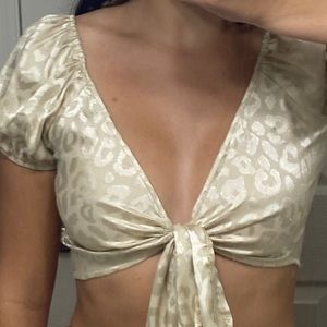 Cheetah Print Gold V-Neck Crop Top with ribbon tie.